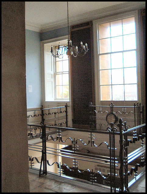 first floor landing and chandelier