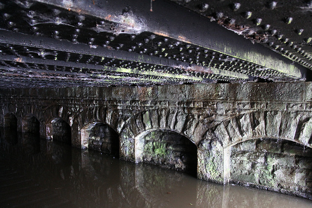 Under a railway bridge