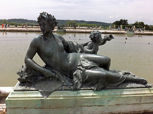 Nymph and Child Blowing on a Sea Shell Sculpture in the Gardens of Versailles, June 2013