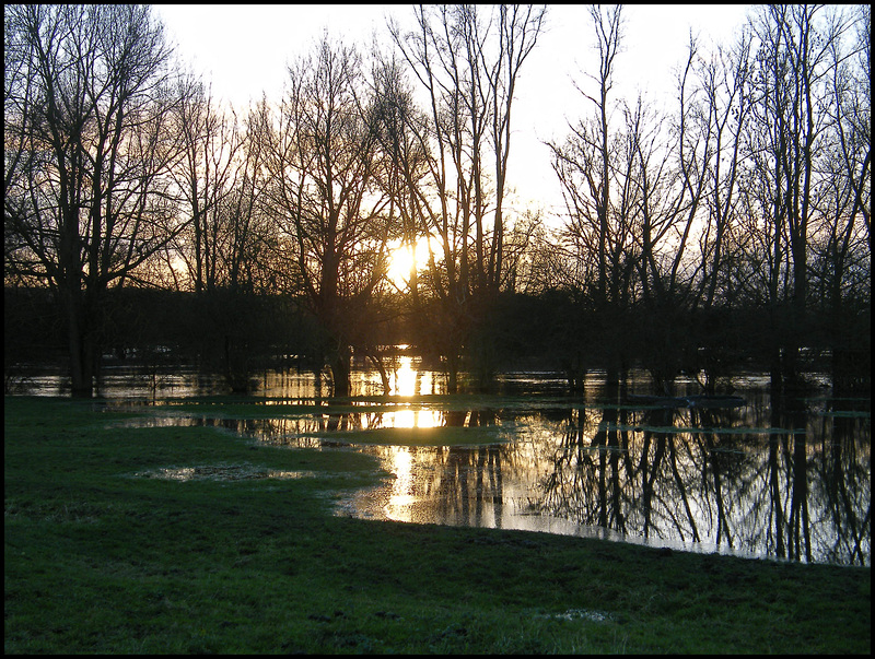 sunset on the flooded land