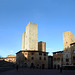 Italy, San Gimignano, Piazza Duomo with Collegiata di Santa Maria Assunta, Salvucci Twin Towers, Torre Pesciolini, Torre Chigi, Torre Rognosa