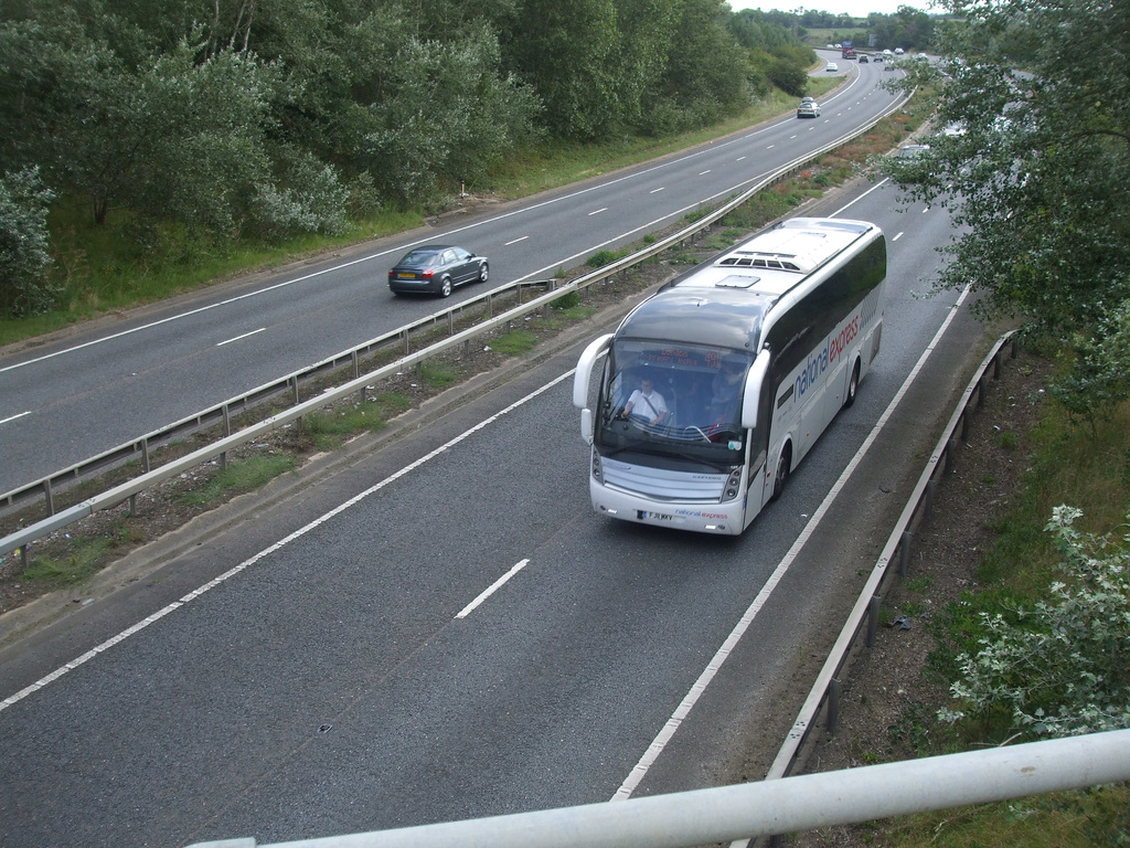 Ambassador Travel (National Express contractor) 129 (FJ11 MKV) on the A11 at Red Lodge - 5 Aug 2017 (DSCF9100)