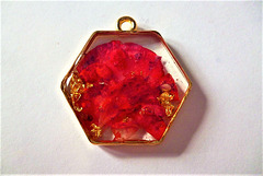 Red geranium petals with gold leaf