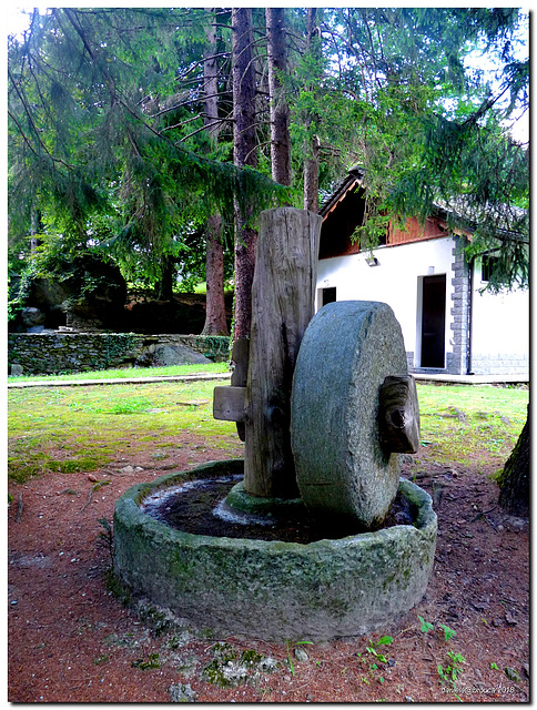 Millstone in the  Spa park of Crodo