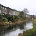 Canal side housing