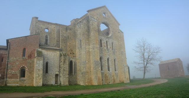 Italy, View from the East to the Abbey of San Galgano in the Morning Fog