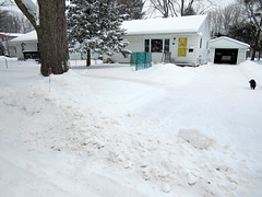 The snow plow closes our  driveway every time it snows.