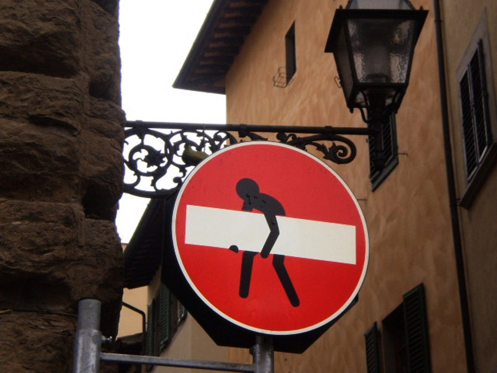 Street art on road sign.