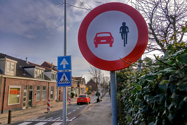 Forbidden for red cars and black cyclists Forbidden for red cars and black cyclists