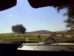 Cracked dashboard with cemetery