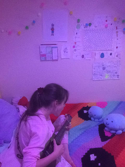 Singing to her new friends