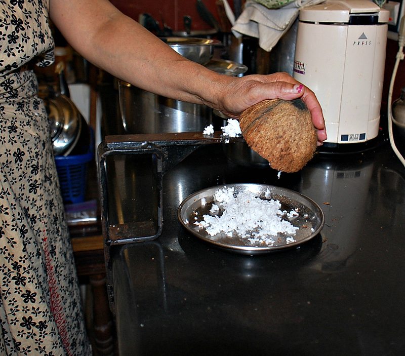 Grating the coconut