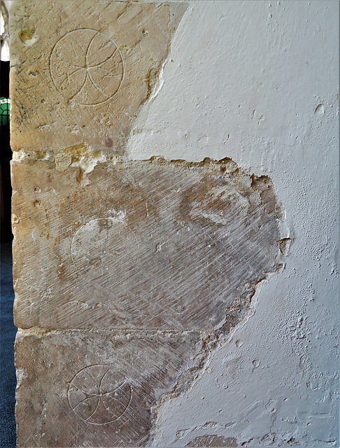 multiple daisy wheel graffiti on south arcade, woodnesborough church, kent (9)