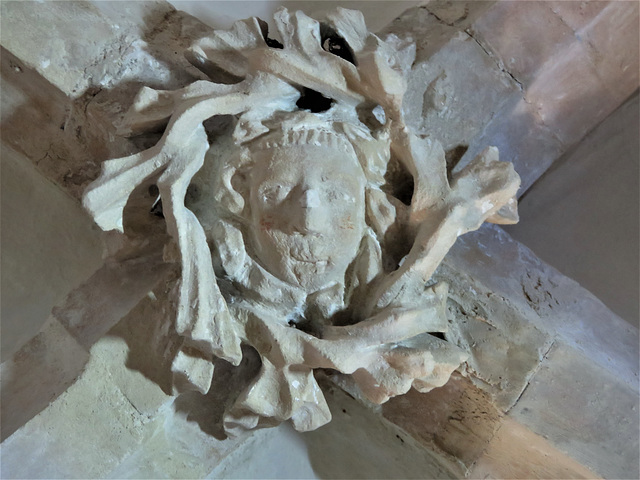 boss on vaulting of c14 sedilia,  woodnesborough church, kent