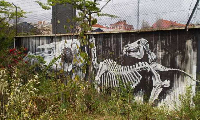 Skeletons - painting on inside wall of ancient factory.