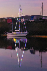 Yacht with Fairy Lights at Dawn, River Leven