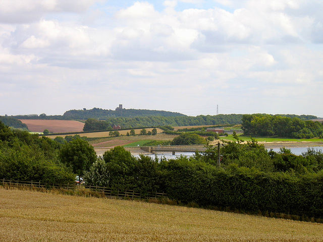 Looking over Staunton Harold Reservoir to the Priory Church of St Mary and St Hardulph at Breedon on the hill