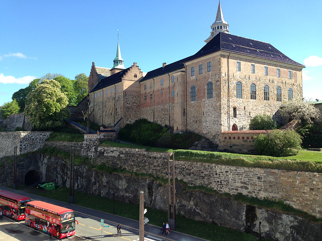 Akershus fortress with hop-on tour buses at the ready for us.