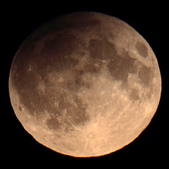 Newly-risen, penumbrally-eclipsed full Moon