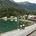Bernina Red Train - On the coast of the Poschiavo Lake, Switzerland