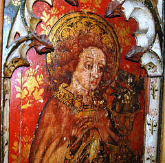 Detail of figure of St John on the screen at Old Hunstanton Church, Norfolk