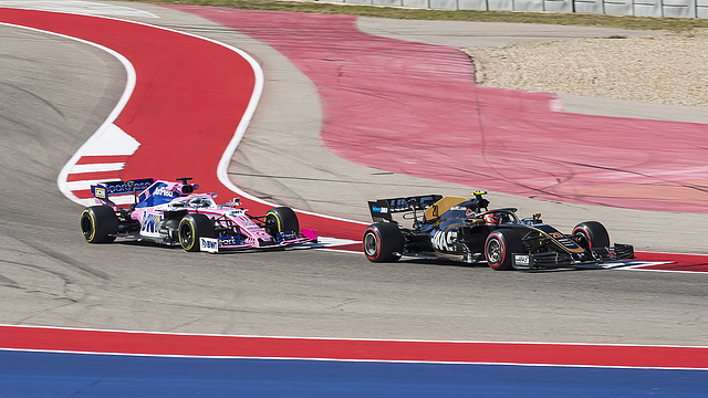 Kevin Magnussen and Sergio Pérez at the United States Grand Prix