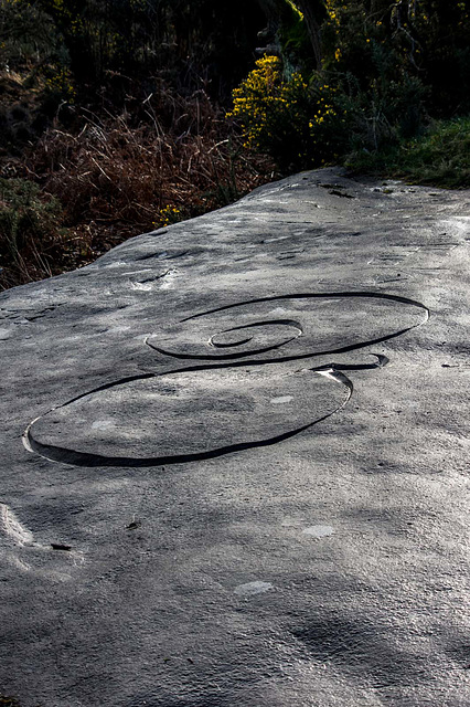 Design cut into a sandstone rock