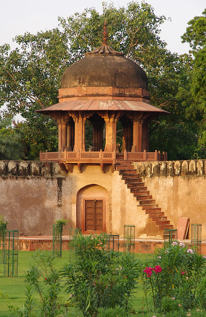 Corner domed building with 'floating' steps