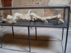Replica in plaster of victim of Vesuvius eruption.