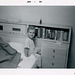 A Boy and a Bedside Bookshelf