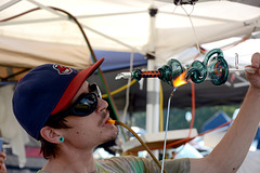 A glassblower demonstrates his craft