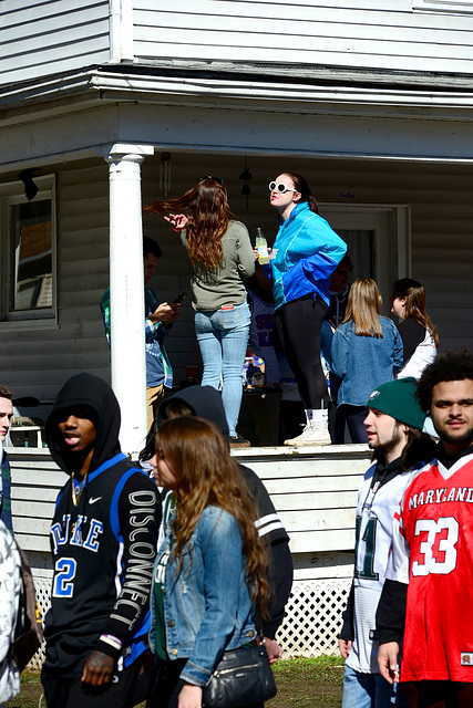 Standing on the porch rail