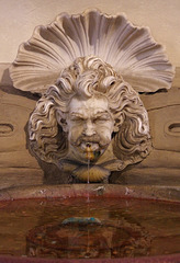 Billy Connolly spits in a basin