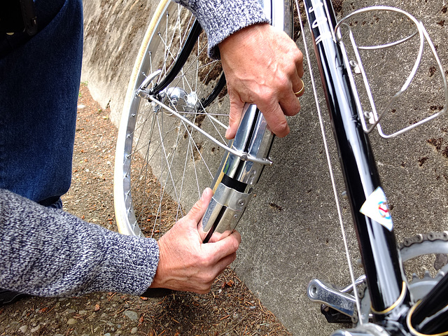 Pulling downward on lower fender detaches it