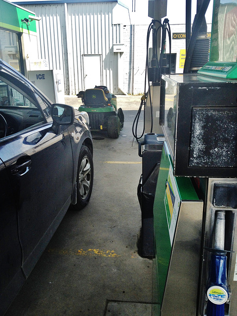 ride on mower at the petrol station