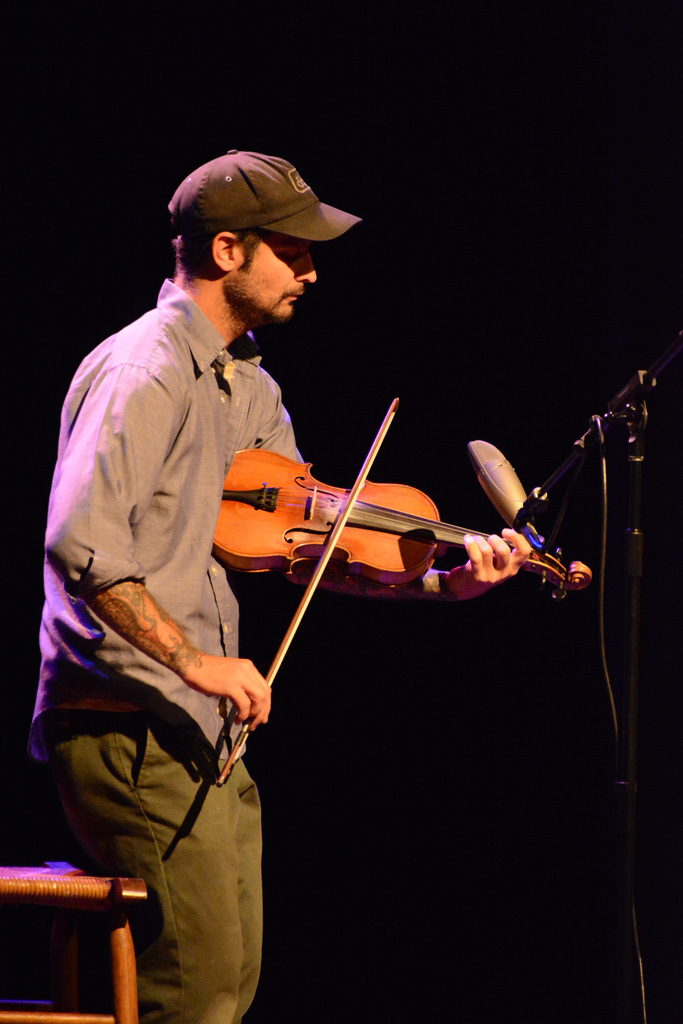 Not all fiddlers tuck the instruments under their chins