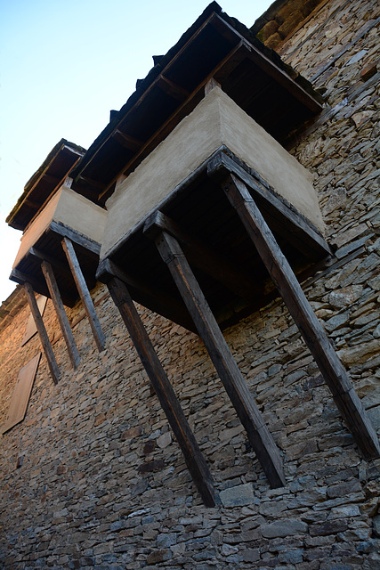 Bulgaria, Kovachevitsa, Wooden Balconies Attached to the Stone Wall of a House Bulgaria, Kovachevitsa, Wooden Balconies Attached to the Stone Wall of a House
