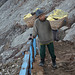 Indonesia, Java, Hard Job of a Porter in the Crater of Ijen Volcano