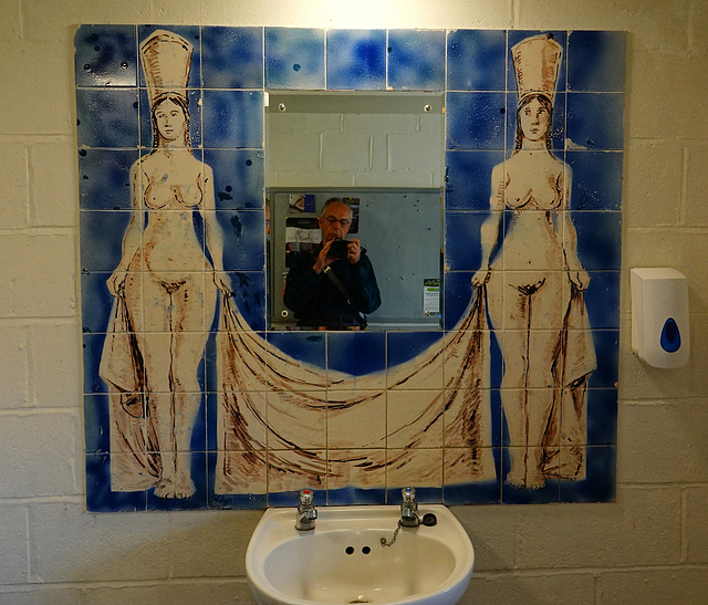 Ladies in the gent's bog.