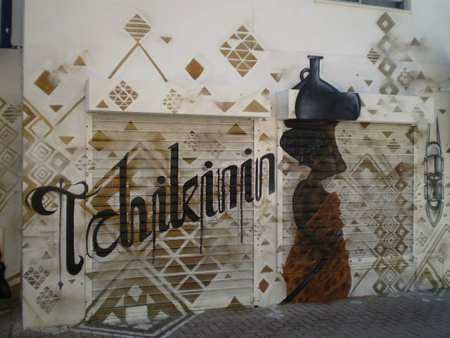 Painted on wall and blinds of Tchikinin Café.