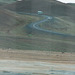 Vestfjarðaleið (Vest Travel) coach passing the steaming mud pools at Hverarond, Northern Iceland - 25 July 2002 (475-32)