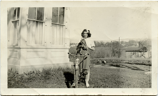 Her Kitty and Her Bike