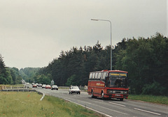 Webber’s Travel JIL 7792 (TMD 278Y) on the A11 at Barton Mills – 4 Jun 1995 (269-34)