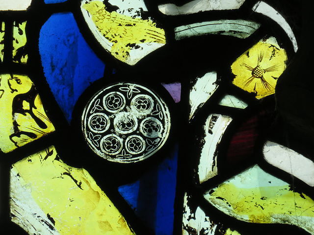 great dunmow church, essex,c14 glass  detail, rose window design on a tiny roundel