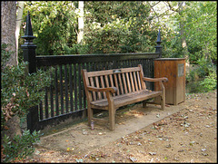 seat by the woodland path