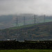 Tintwistle Pylons touching the clouds