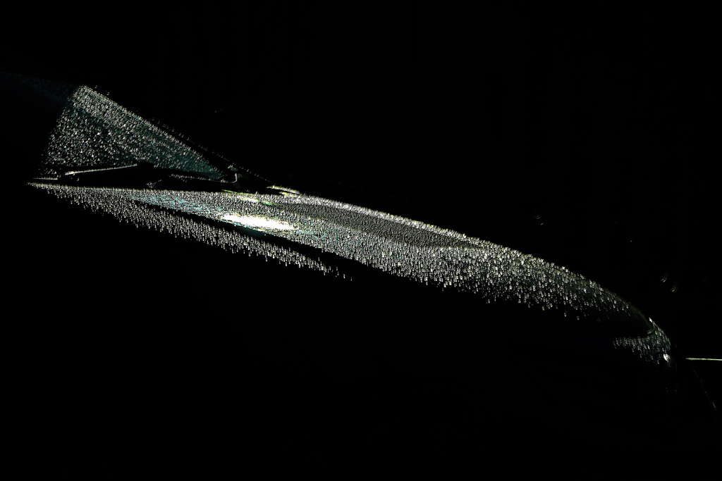 In The Rain. At The Petrol Pumps. Beside The Car Wash