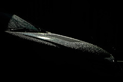 In The Rain. At The Petrol Pumps. Beside The Car Wash