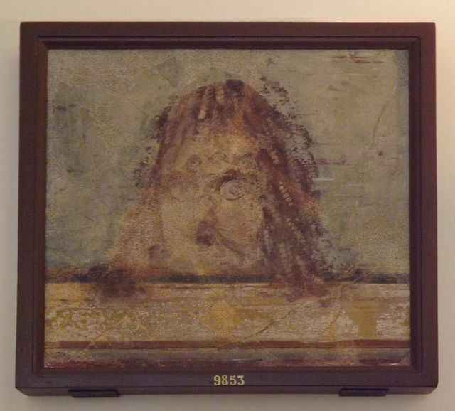 Tragic Mask on Cornice, Wall Painting from Pompeii in the Naples Archaeological Museum, July 2012