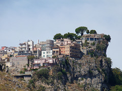 Taormina- Precarious Position